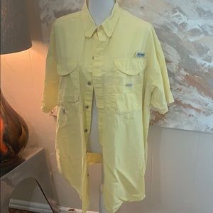Short sleeve light yellow Columbia fishing shirt